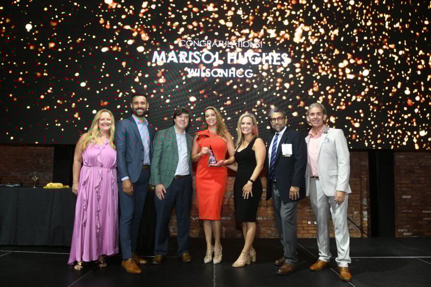 Apogee Awards 2023 with WilsonHCG's Marisol Hughes in center