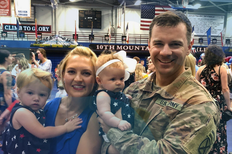 Sarah Kelton with her spouse and two children