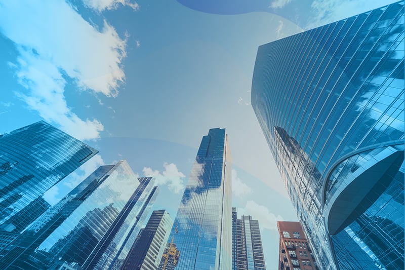 Down-up view of buildings with a blue swish filter