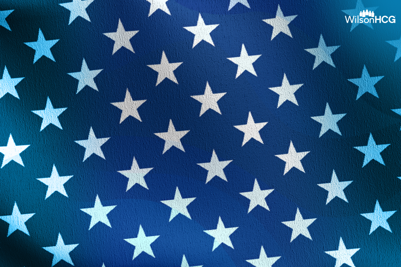 Zoom-up of American flag with blue background and white stars