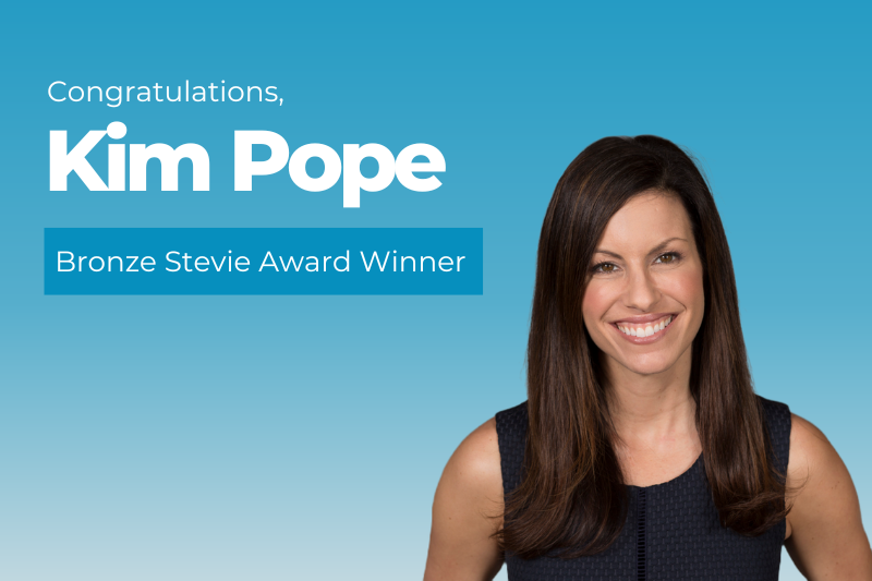 WilsonHCG's Kim Pope headshot with Bronze Stevie Award Winner in text