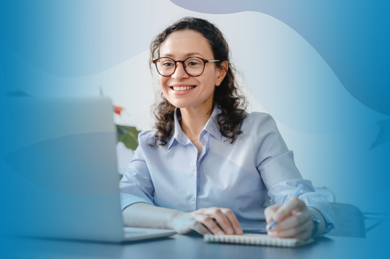 Businesswoman watching LinkedIn Live on laptop. 