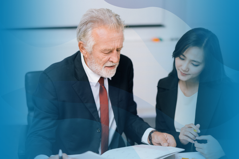 Two employees from different generations working together