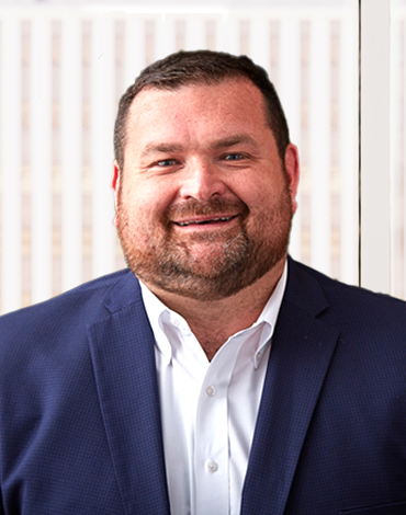Ryan Carfley_headshot_WilsonHCG_2023 Ryan Carfley_headshot_WilsonHCG_2023