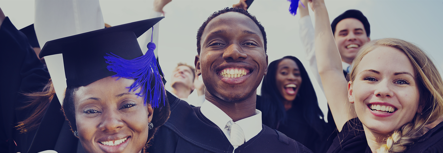 Man smiling at graduation