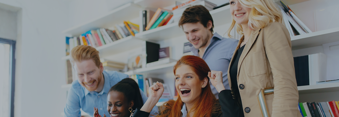 Group of workers cheering together