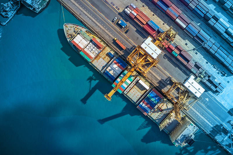 aerial shot of supply ship in harbor