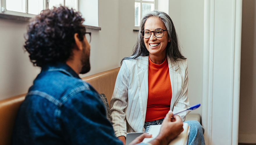 Two people in a mentoring conversation
